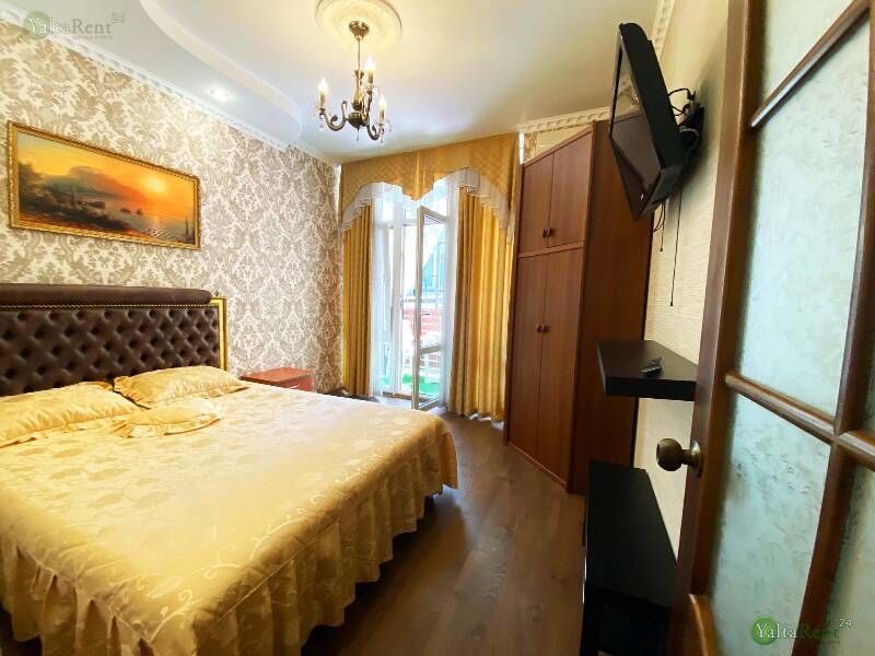 Фото: Двухкомнатная квартира в гостевом доме  возле набережной в Ялте
